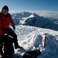 Day 9: Bob just before the descent off Am Bodach, Aonach Eagach Ridge. Bidean in the background. (Sean Kelly)